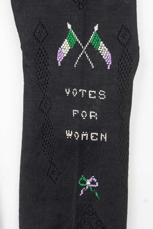 Detail of Suffragette stockings. Image copyright the Olive Matthews Collection, Chertsey Museum. Photo by John Chase Photography