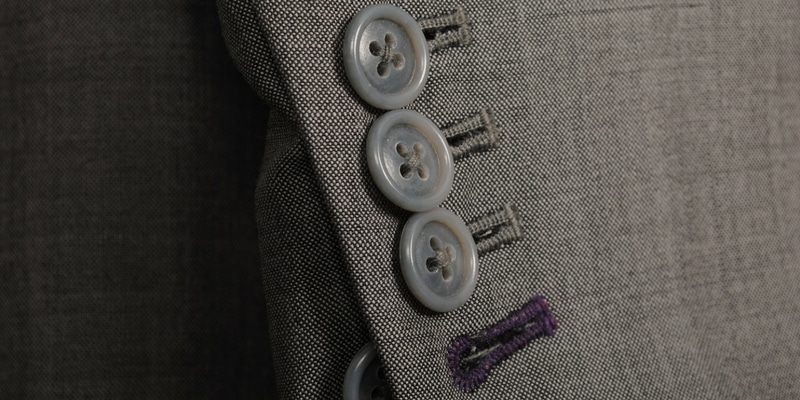 Which suit hot sale jacket button