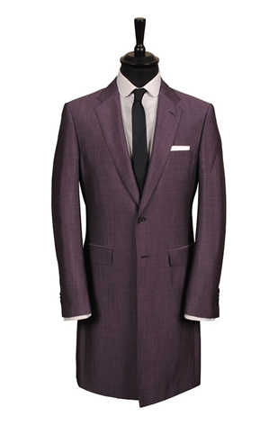 A beautiful nod to 60’s mod-style fashion in our purple mohair knee-length jacket