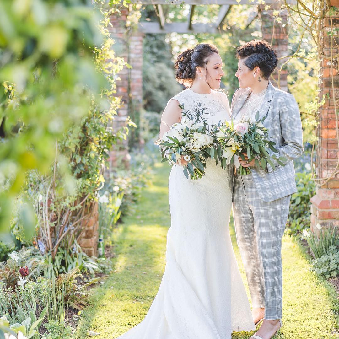 (2019's Winning photo from King & Allen client Deanne Tomkins. This elegant and bold two-piece, grey check suit won with 800 votes on Facebook!)